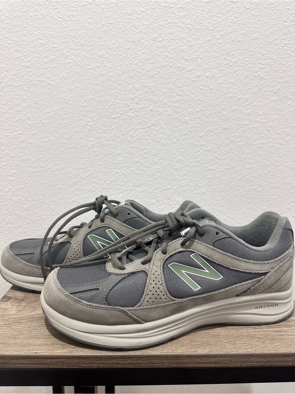 New Balance Men’s Gray Athletic Shoes with Green Logo Accent